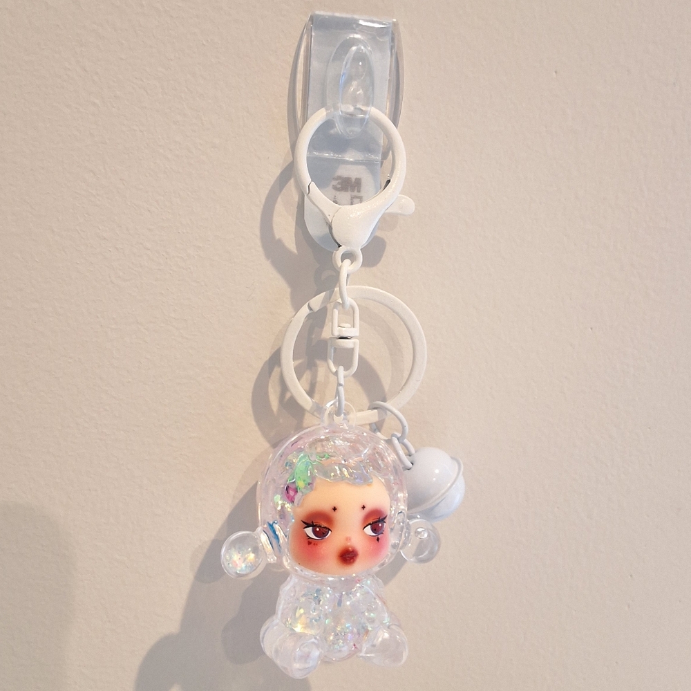 Skullpanda Clear Beaded Liquid Filled Shaker White Keychain Bag Charm W/ Bell